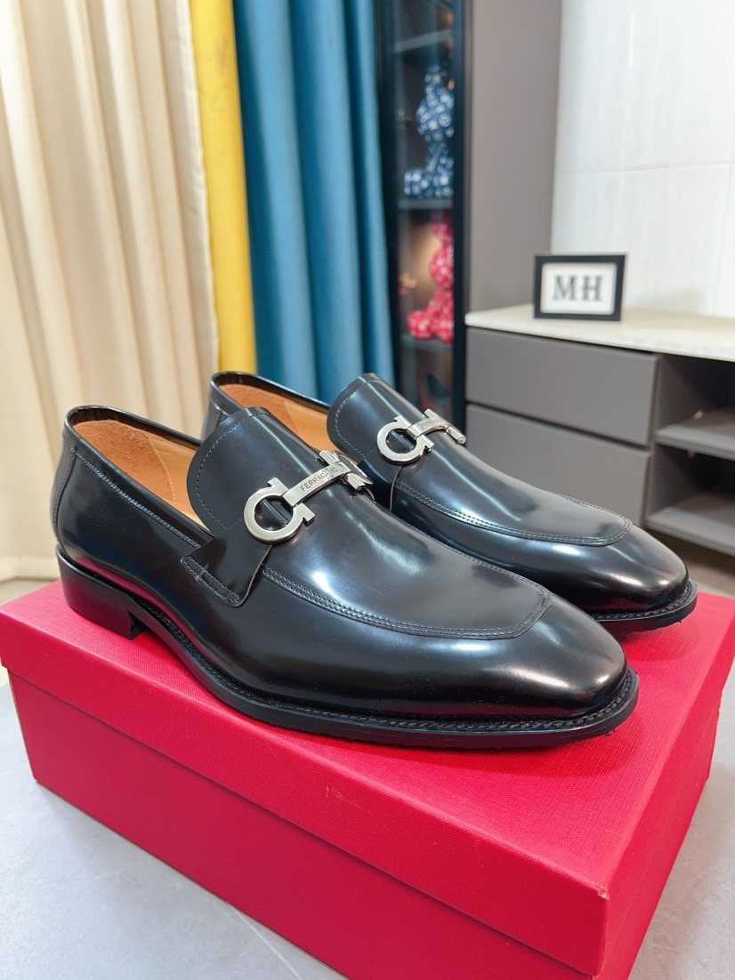 Ferragamo Black Hardware Loafers — hero
