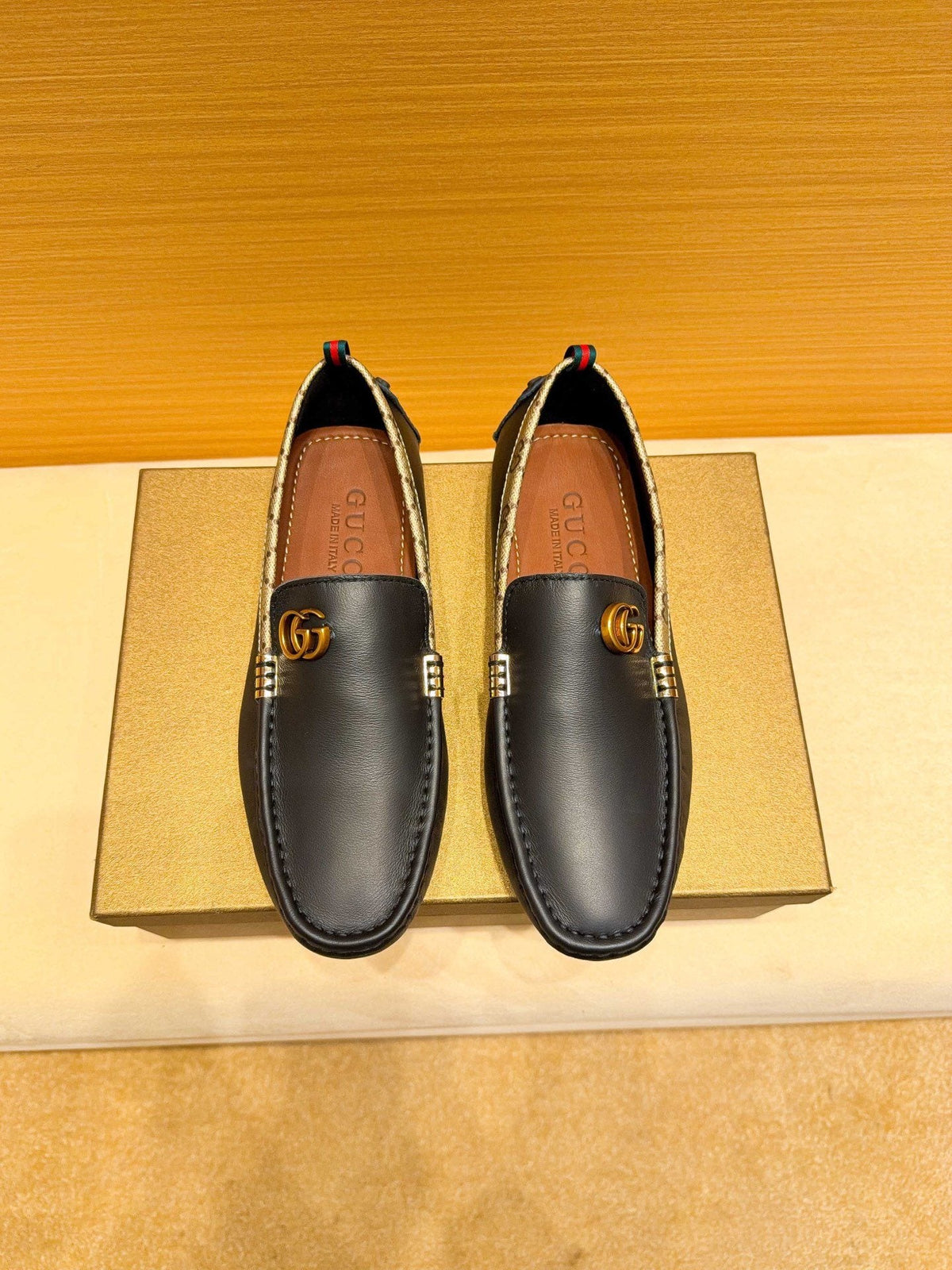 Gucci Black Loafers with Patterned Trim — hero