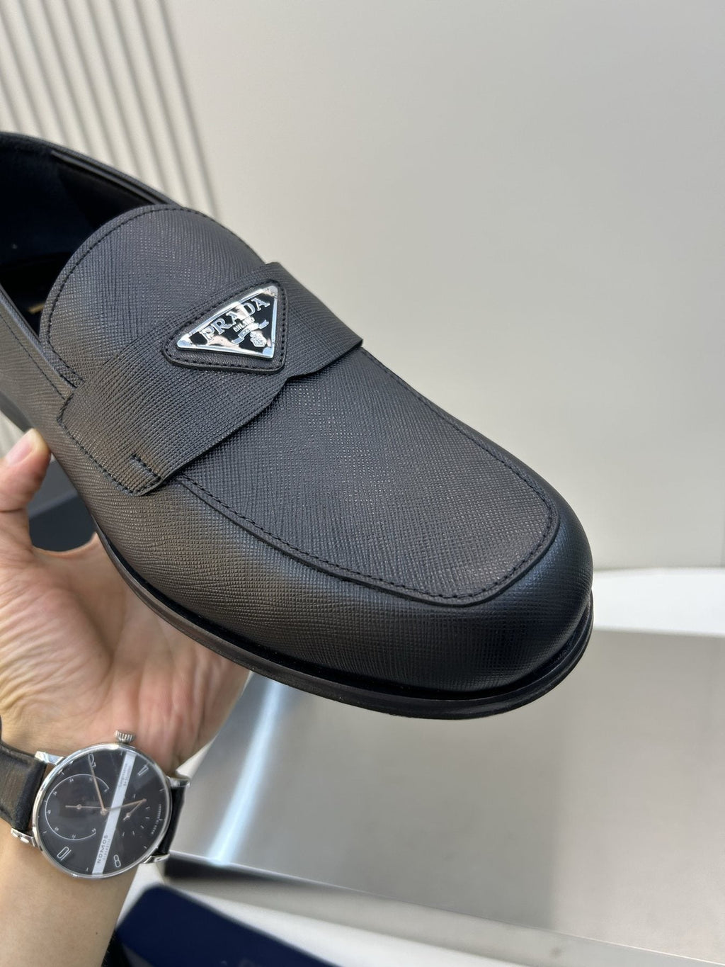 Prada Black Triangular Plaque Loafers — detail