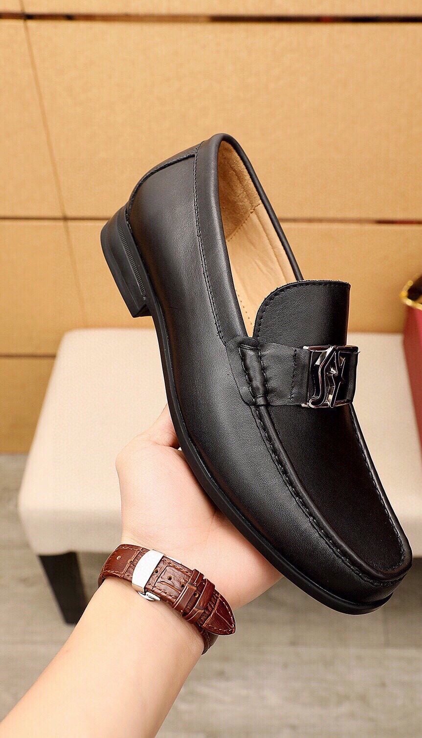 Ferragamo Black Metal Hardware Loafers — front