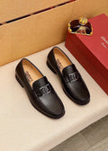 Ferragamo Black Metal Hardware Loafers — hero