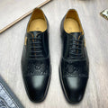Gucci Black Embossed Lace-Up Dress Shoes — hero