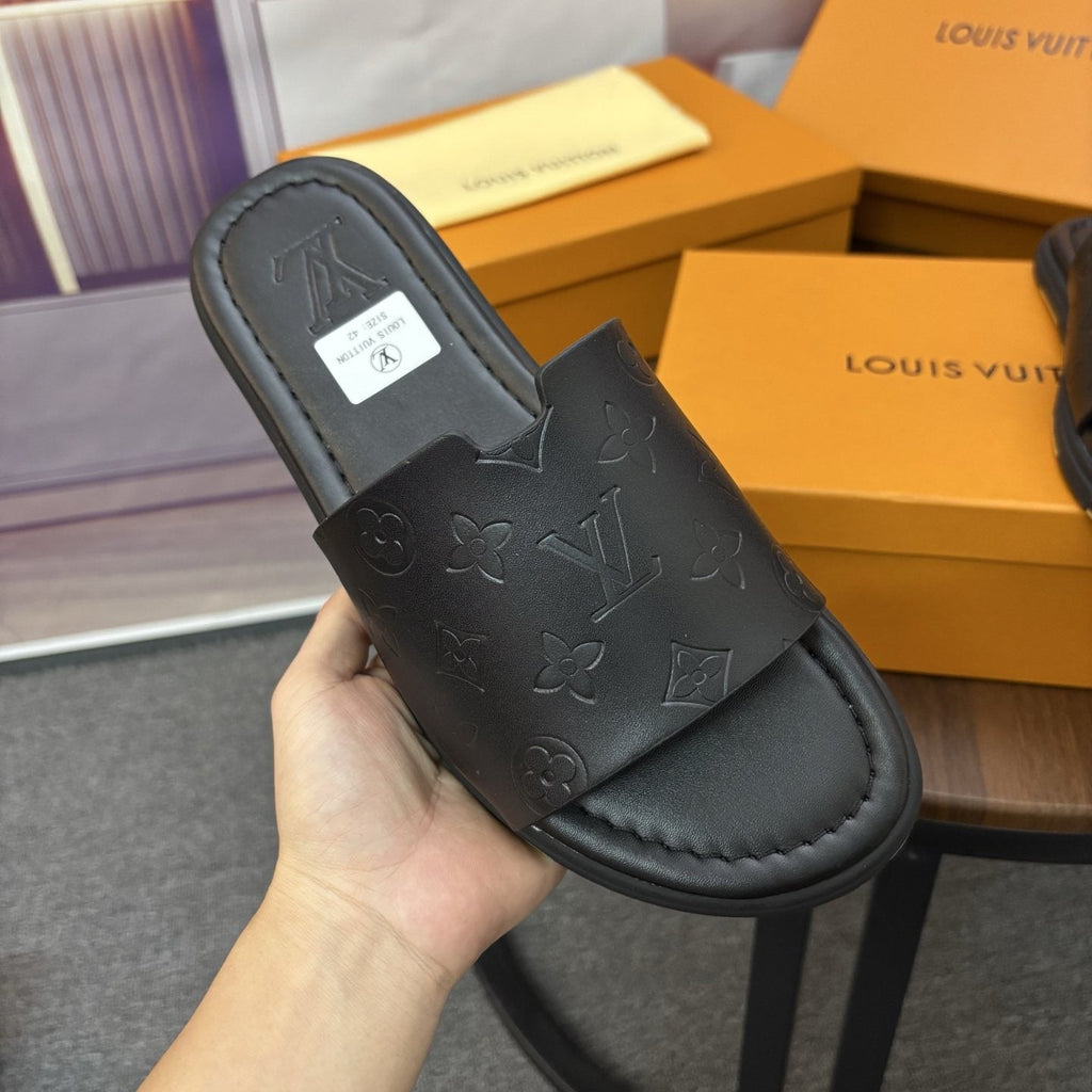 Louis Vuitton Black Embossed Slide Sandals — detail