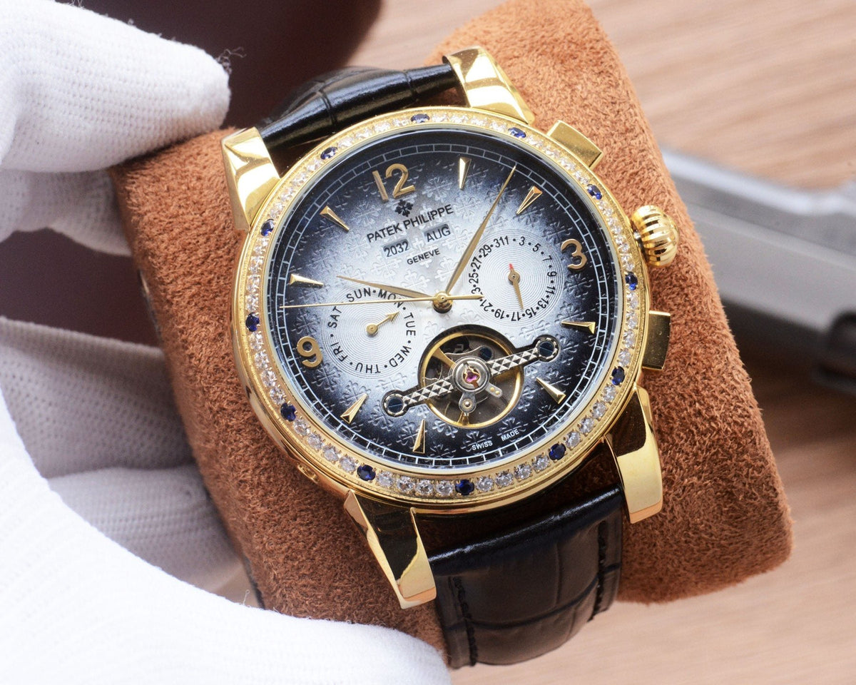 Patek Philippe Gold Black Silver Dial Leather Strap Watch — hero
