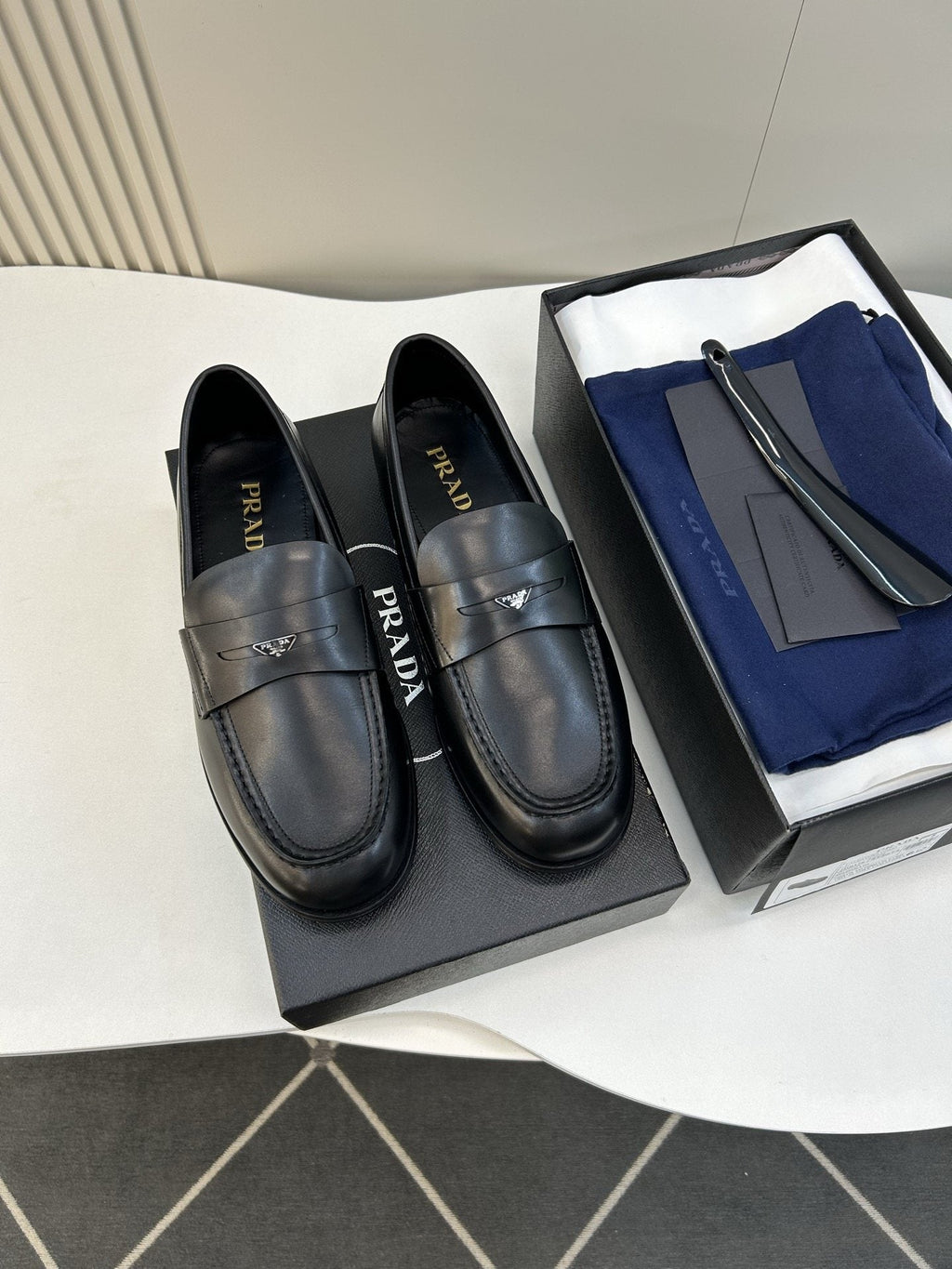 Prada Black Leather Penny Loafers — hero