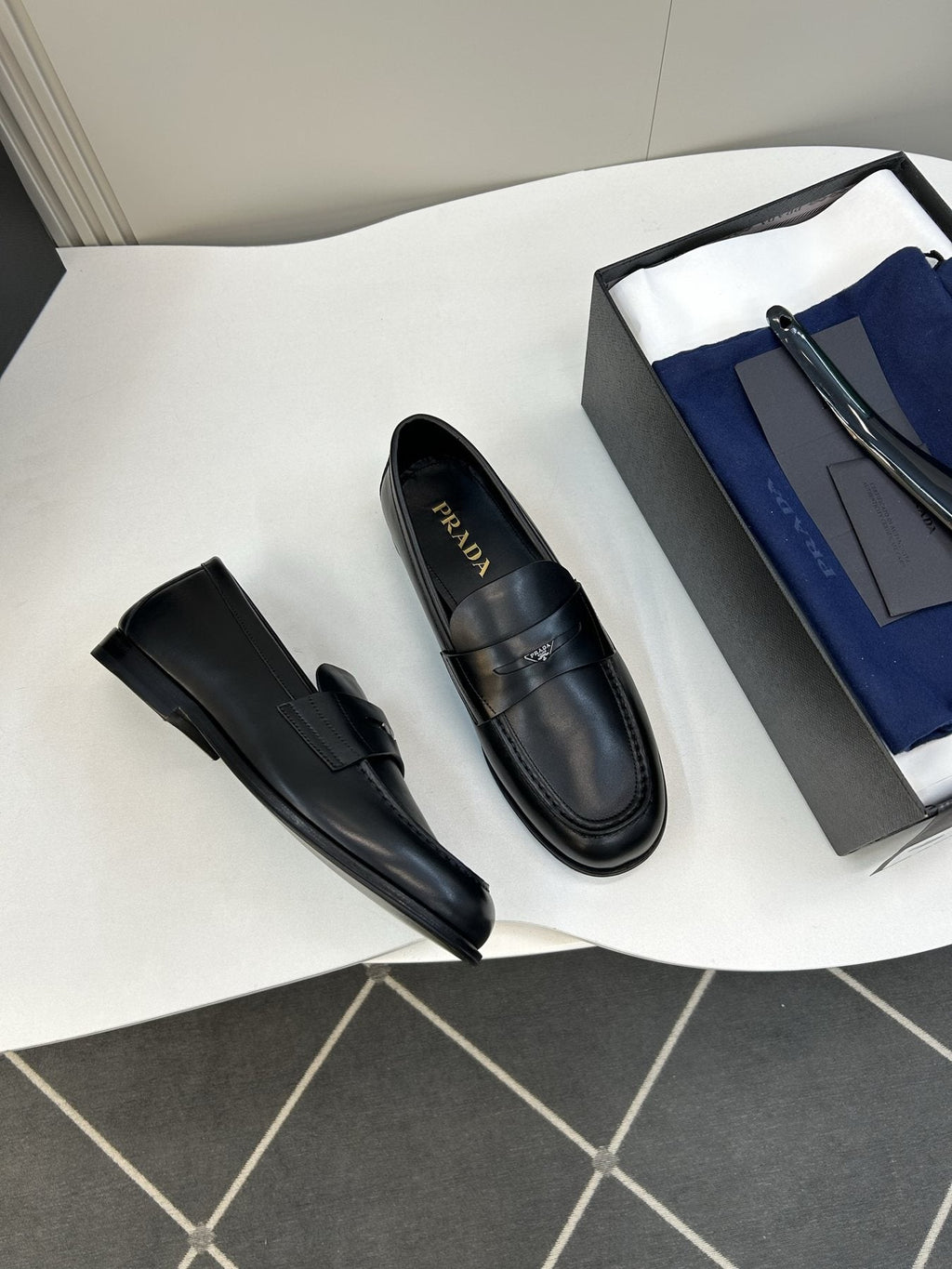 Prada Black Leather Penny Loafers — side
