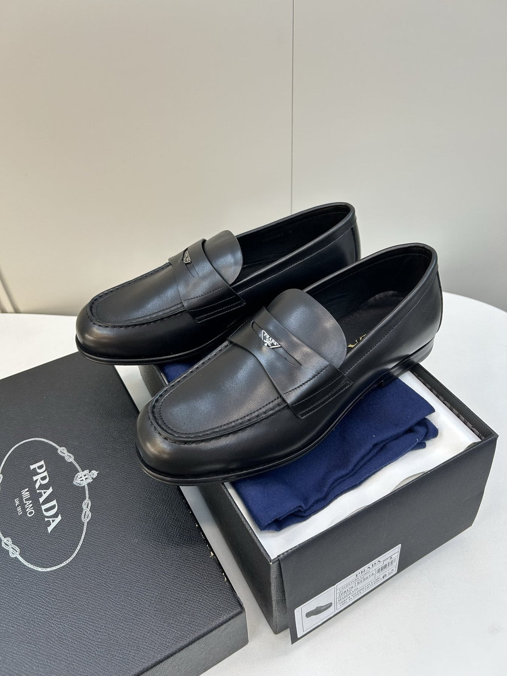 Prada Black Leather Penny Loafers — front