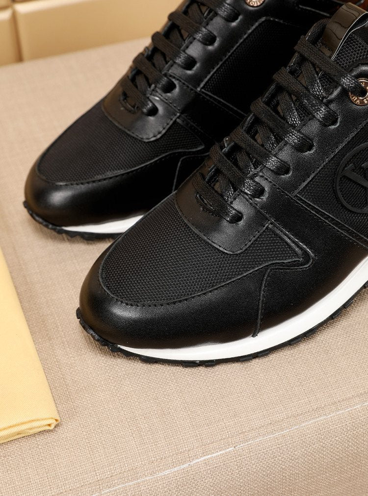 Louis Vuitton Black Gold Accent Sneakers — detail