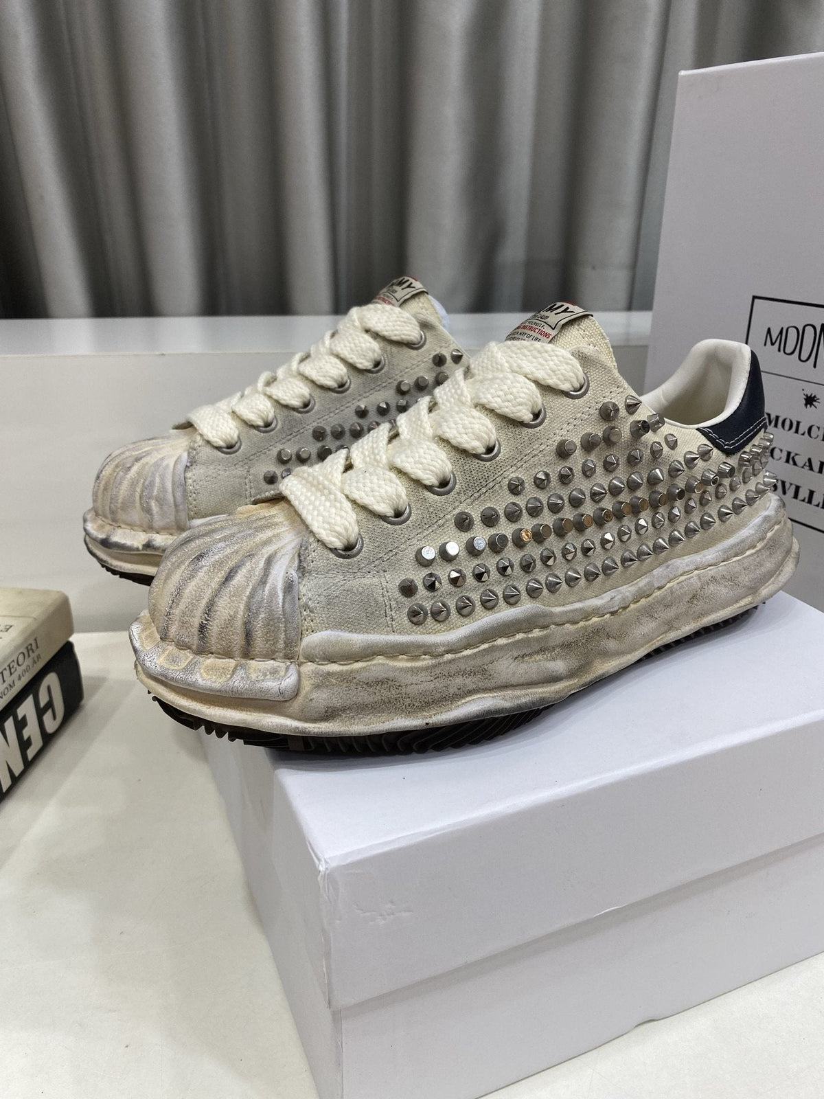 Maison Mihara Yasuhiro Distressed Studded Low-Top Sneakers — hero