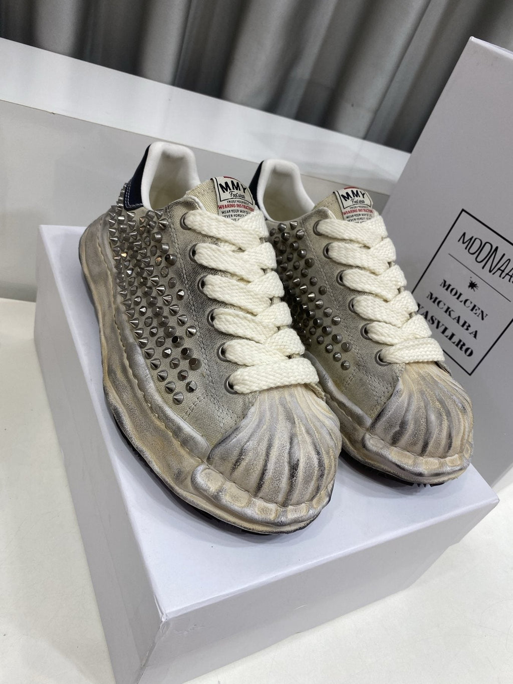 Maison Mihara Yasuhiro Distressed Studded Low-Top Sneakers — front