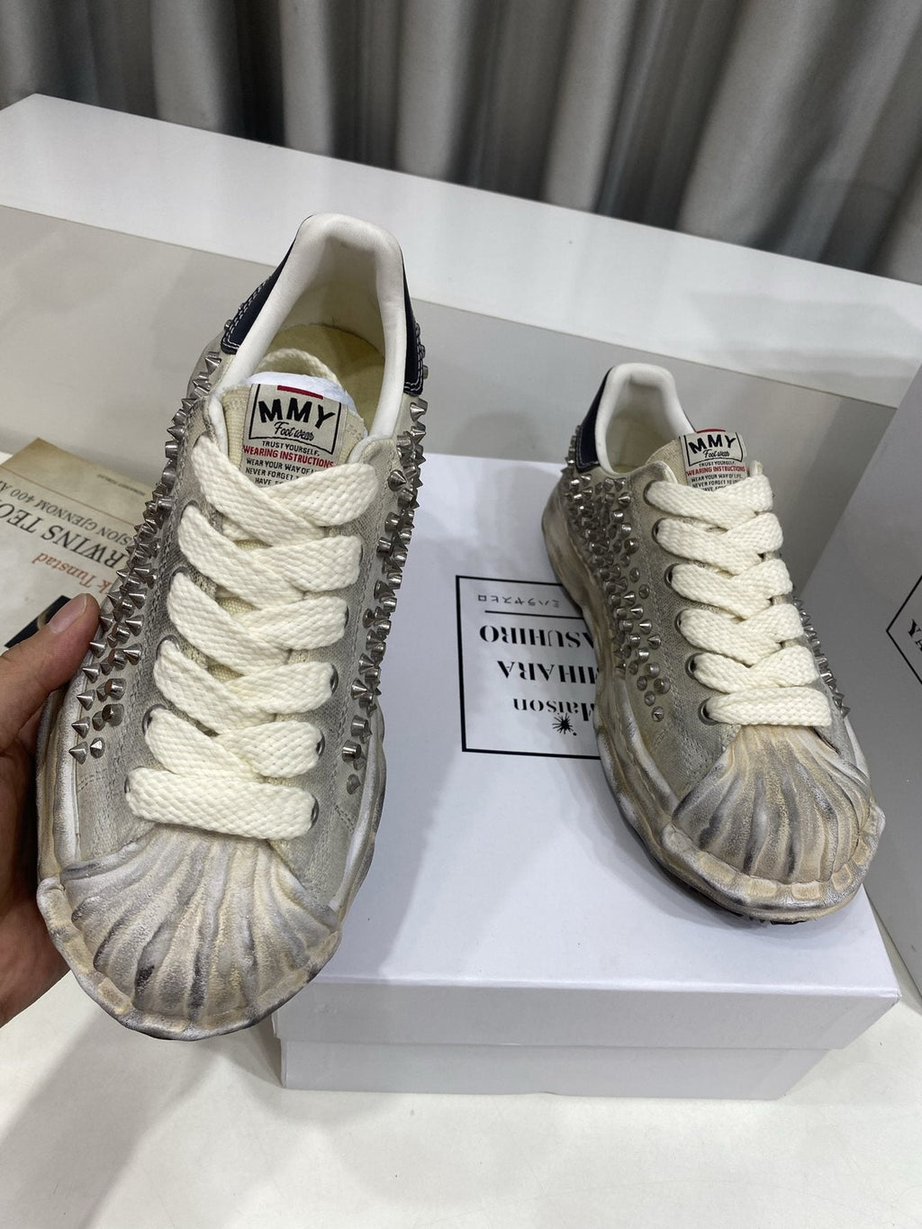 Maison Mihara Yasuhiro Distressed Studded Low-Top Sneakers — front