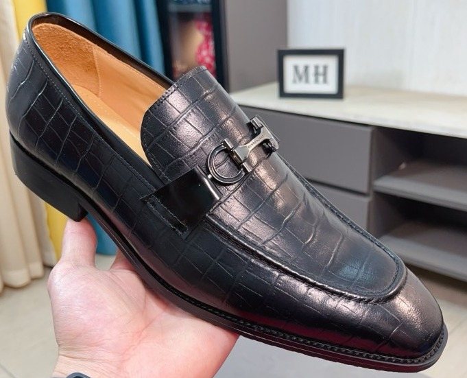 Ferragamo Black Embossed Bit Loafers — front