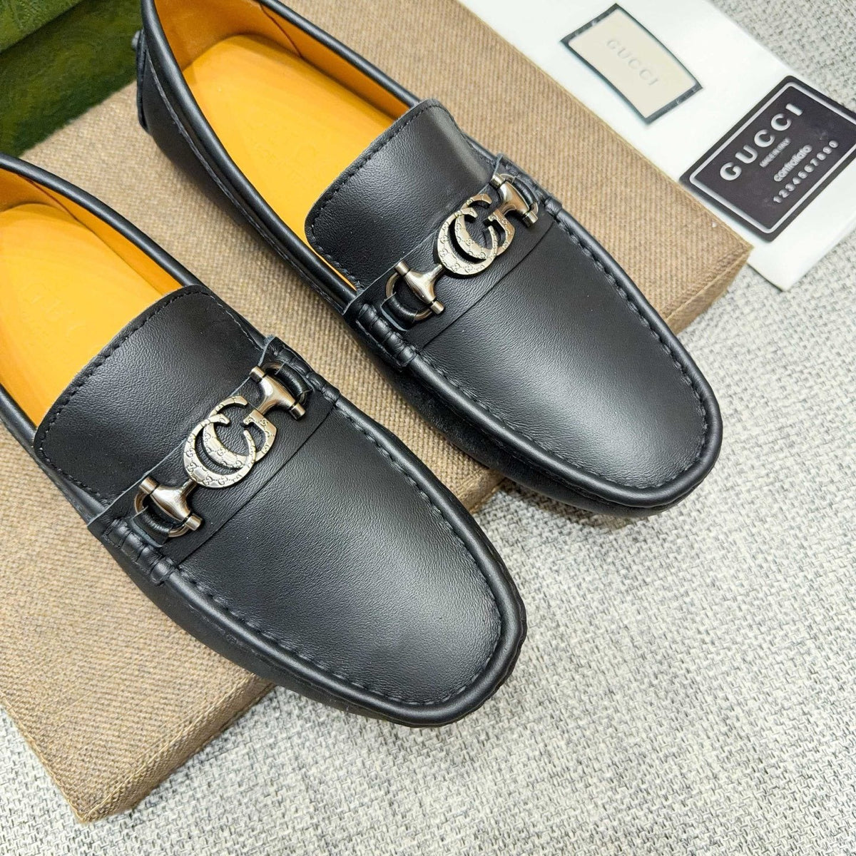 GUCCI Black Metal-Detail Loafers — detail