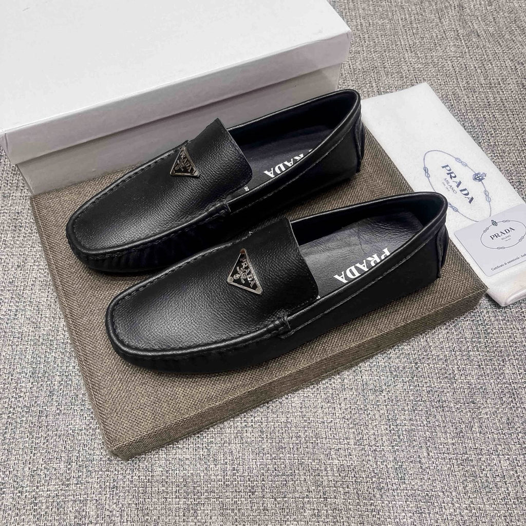 Prada Black Triangle Plaque Loafers — front