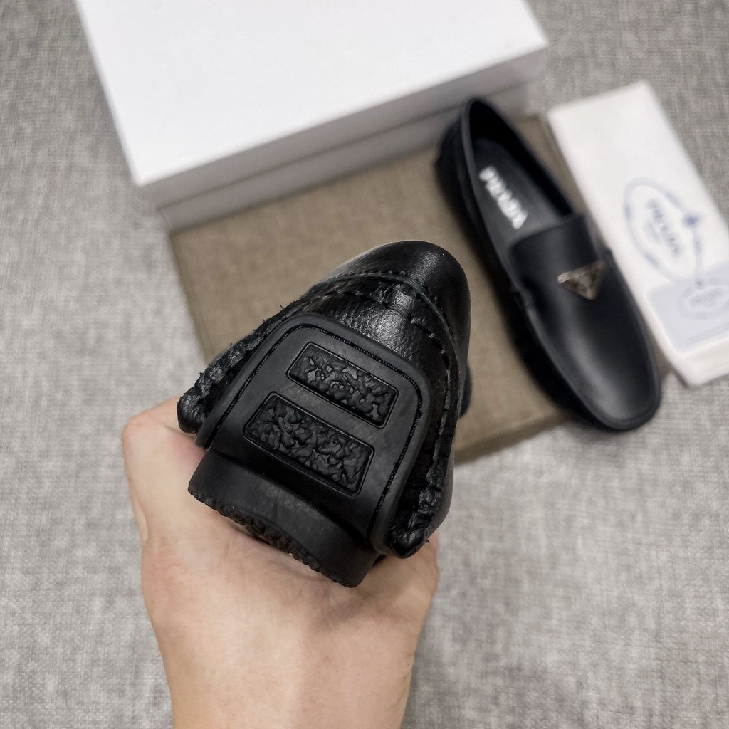 Prada Black Triangle Plaque Loafers — detail