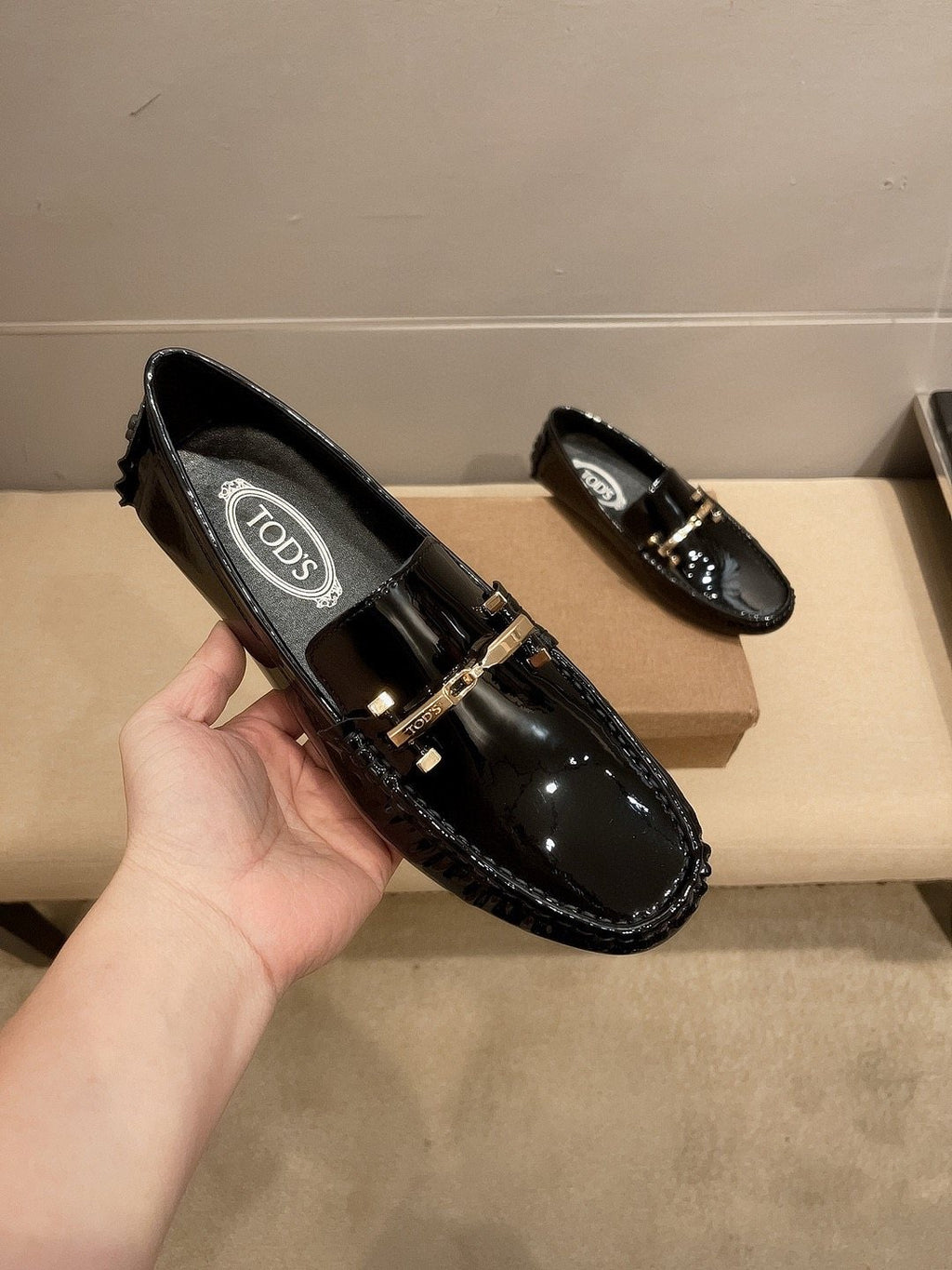 Tod's Glossy Metal Bar Loafers — model