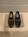 Tod's Glossy Metal Bar Loafers — hero