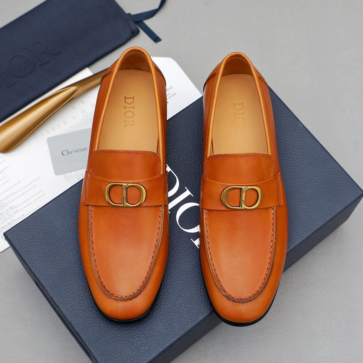 Dior Orange-Brown Buckle Loafers — hero
