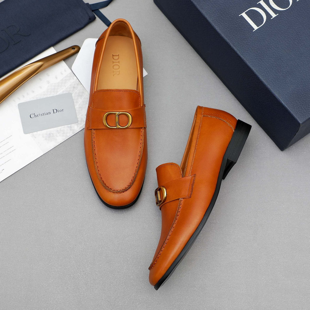 Dior Orange-Brown Buckle Loafers — front
