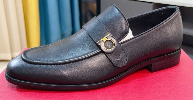 Ferragamo Black Ring-Detail Loafers — hero