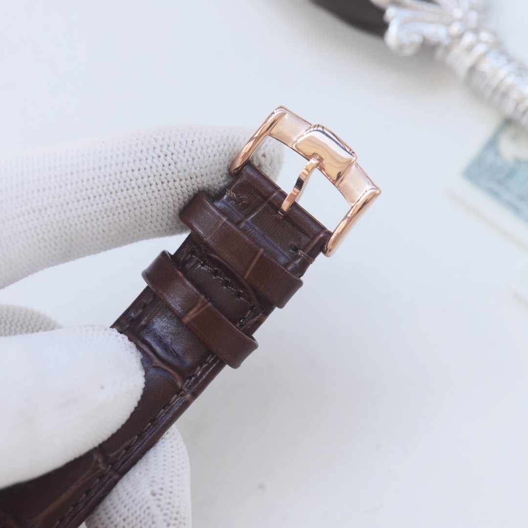 Patek Philippe Rose Gold Brown White Dial Strap Watch — detail