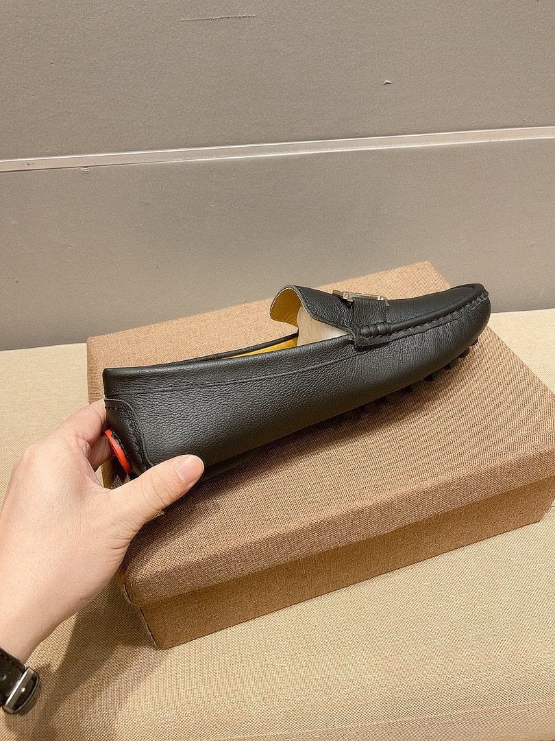 Hermès Black H-Accent Slip-On Loafers — side