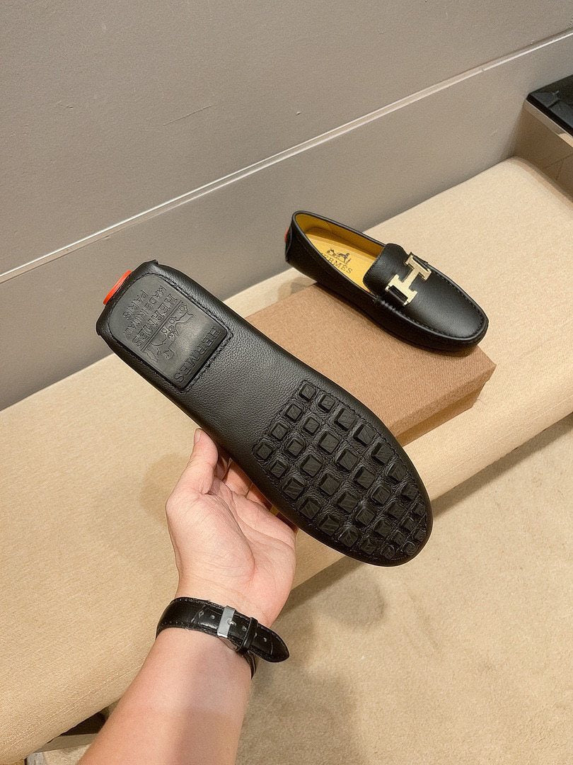 Hermès Black H-Accent Slip-On Loafers — side