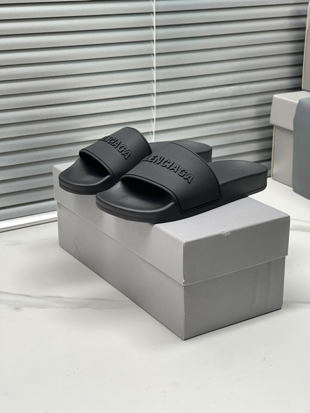 Balenciaga Black Embossed Slide Sandals — hero