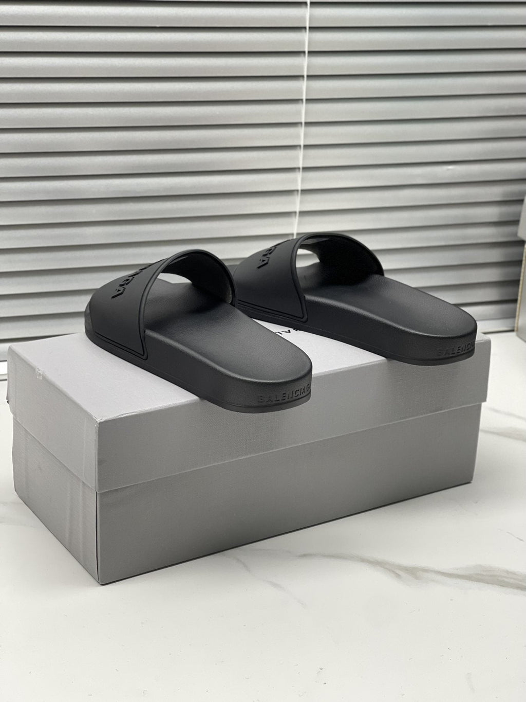 Balenciaga Black Embossed Slide Sandals — front