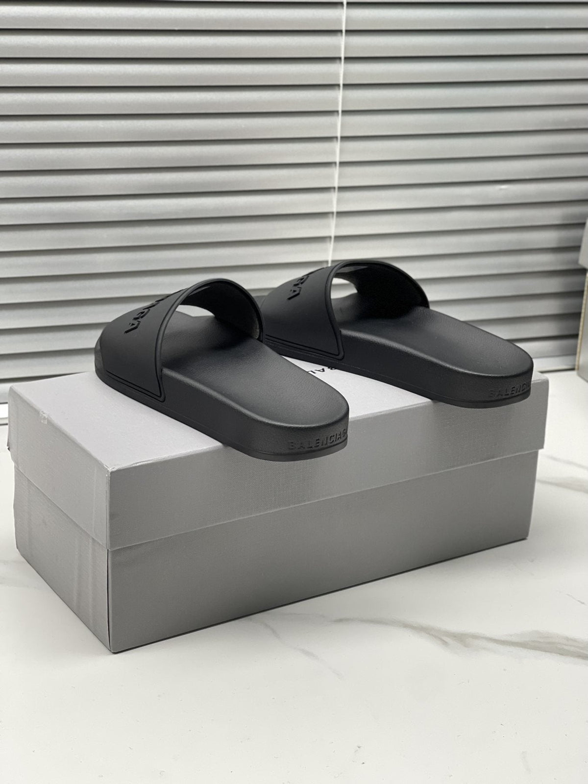 Balenciaga Black Embossed Slide Sandals — front