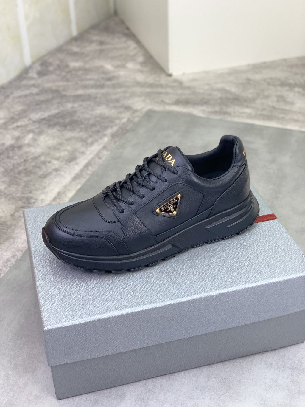 Prada Black Lug Sole Sneakers — side