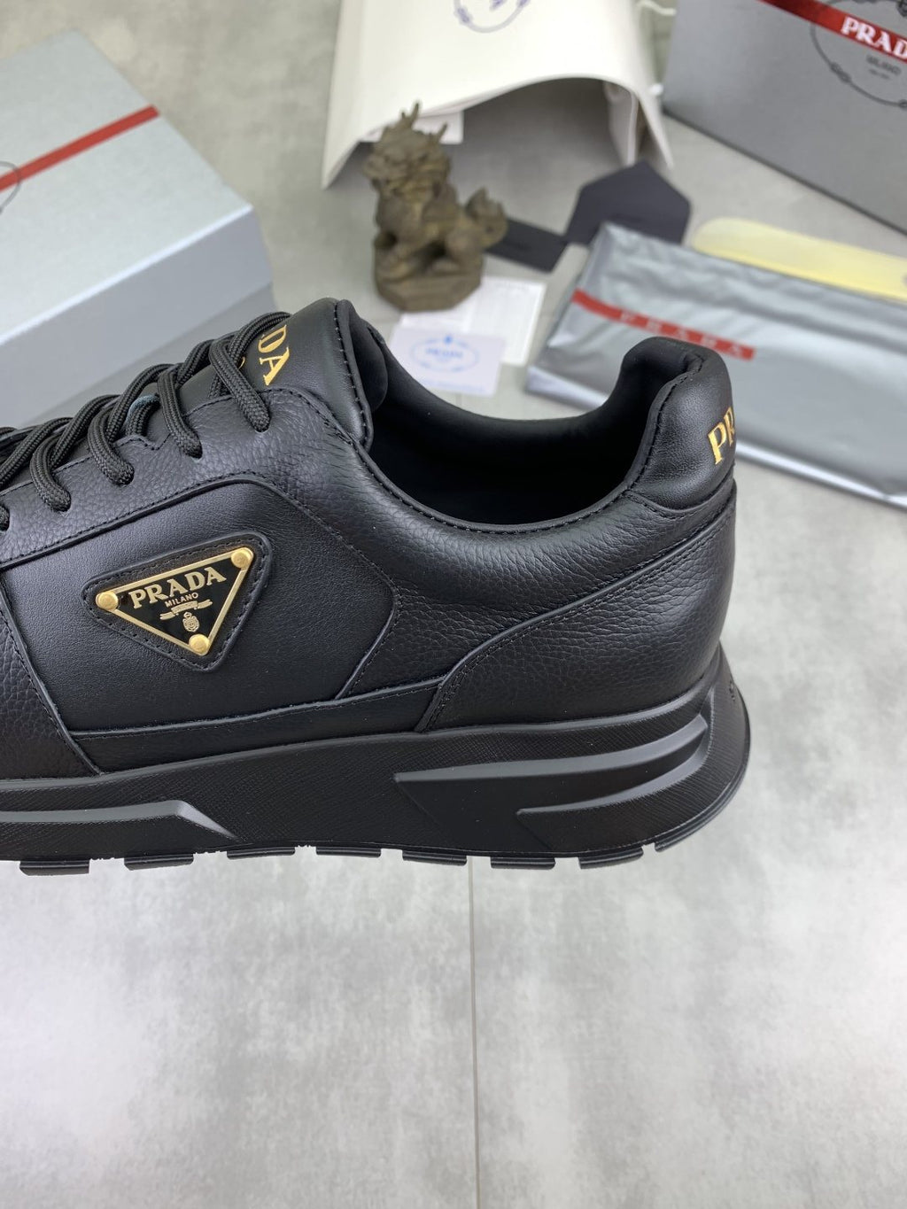 Prada Black Lug Sole Sneakers — detail