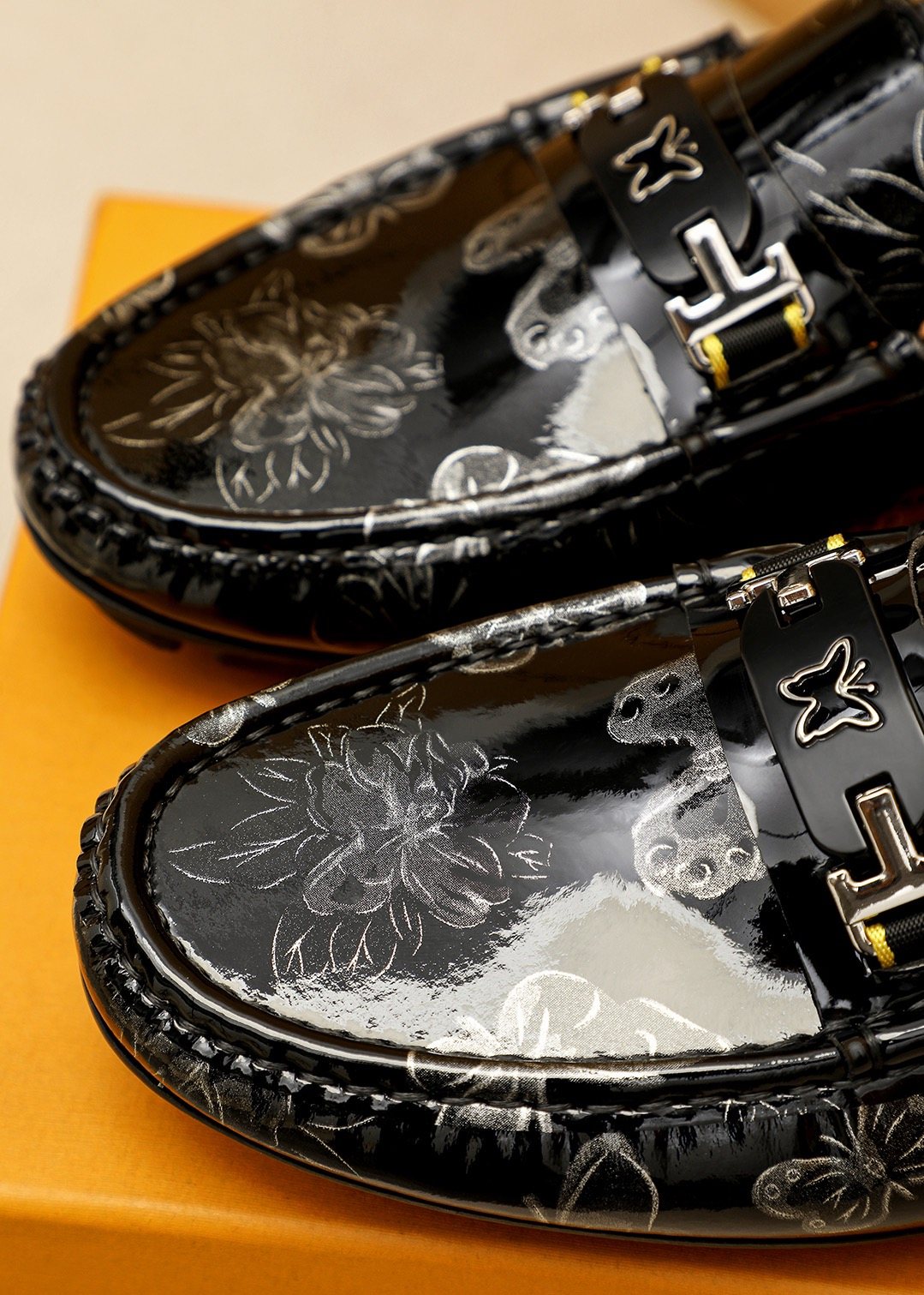 Louis Vuitton Black Floral-Embossed Buckle Loafers — detail
