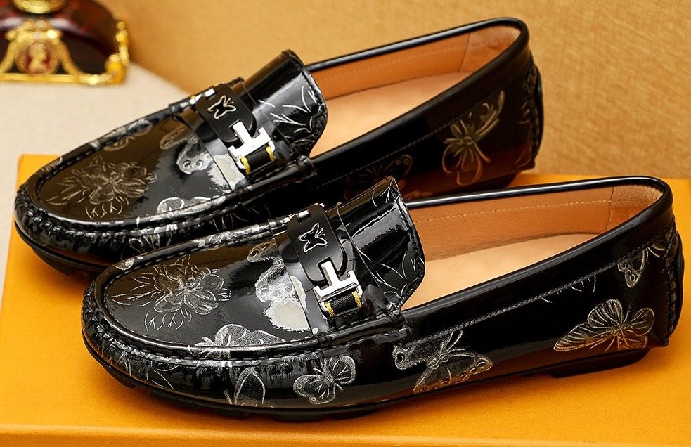 Louis Vuitton Black Floral-Embossed Buckle Loafers — hero
