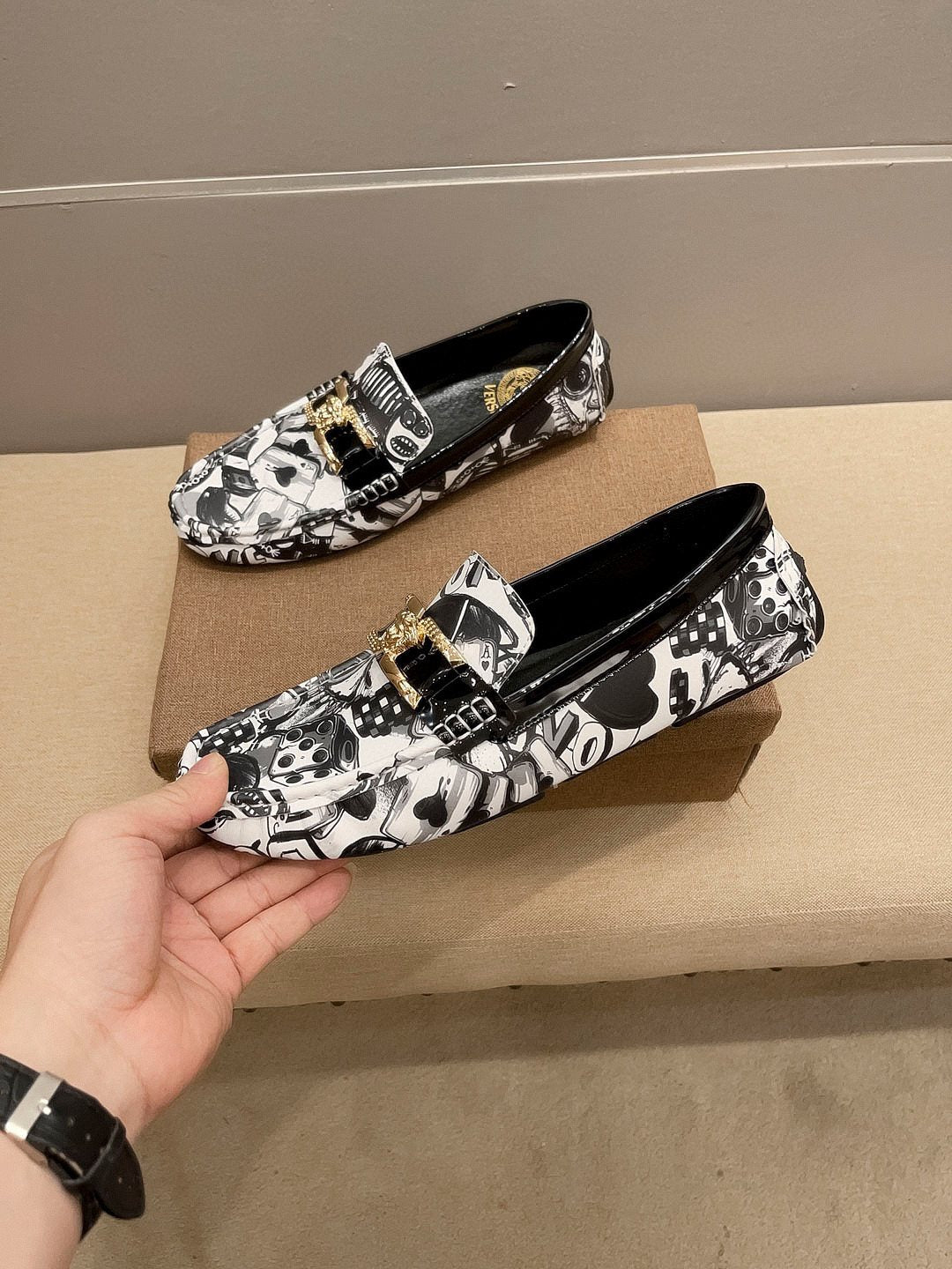 Black & White Graphic Gold-Tone Loafers — model