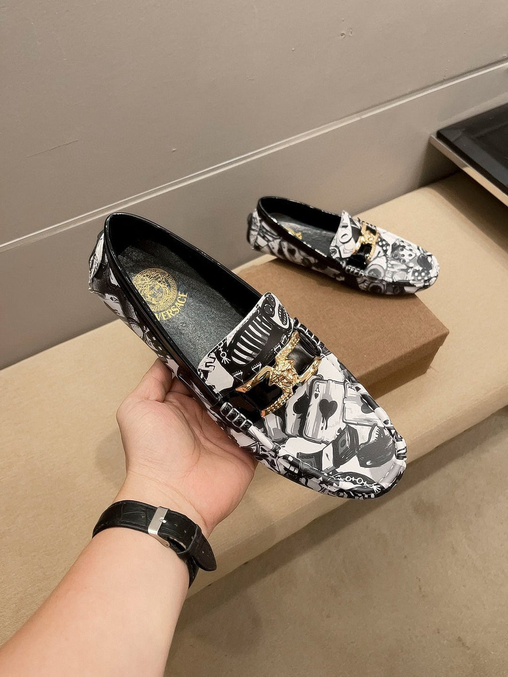 Black & White Graphic Gold-Tone Loafers — model