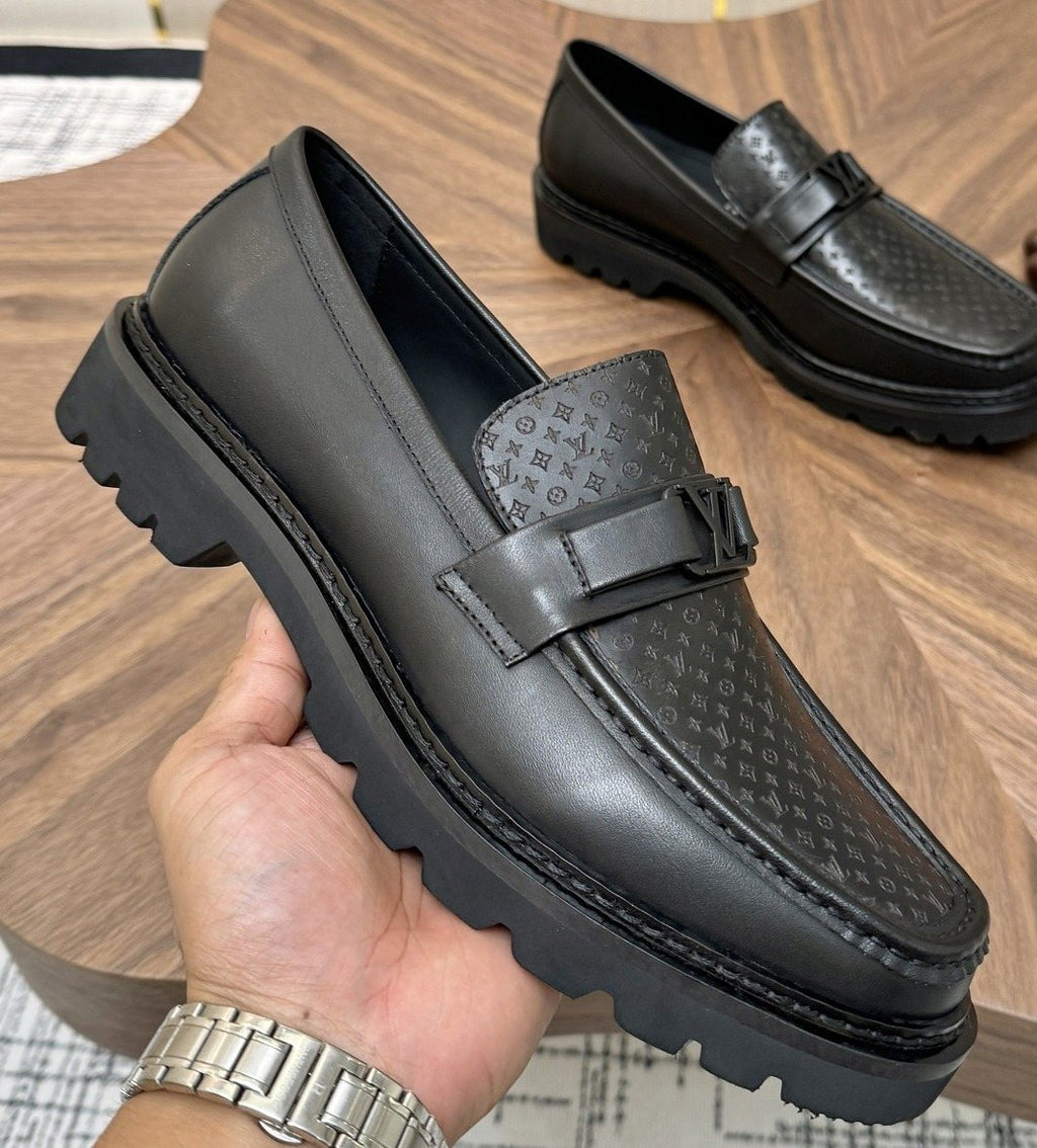 Louis Vuitton Black Textured Loafers — front