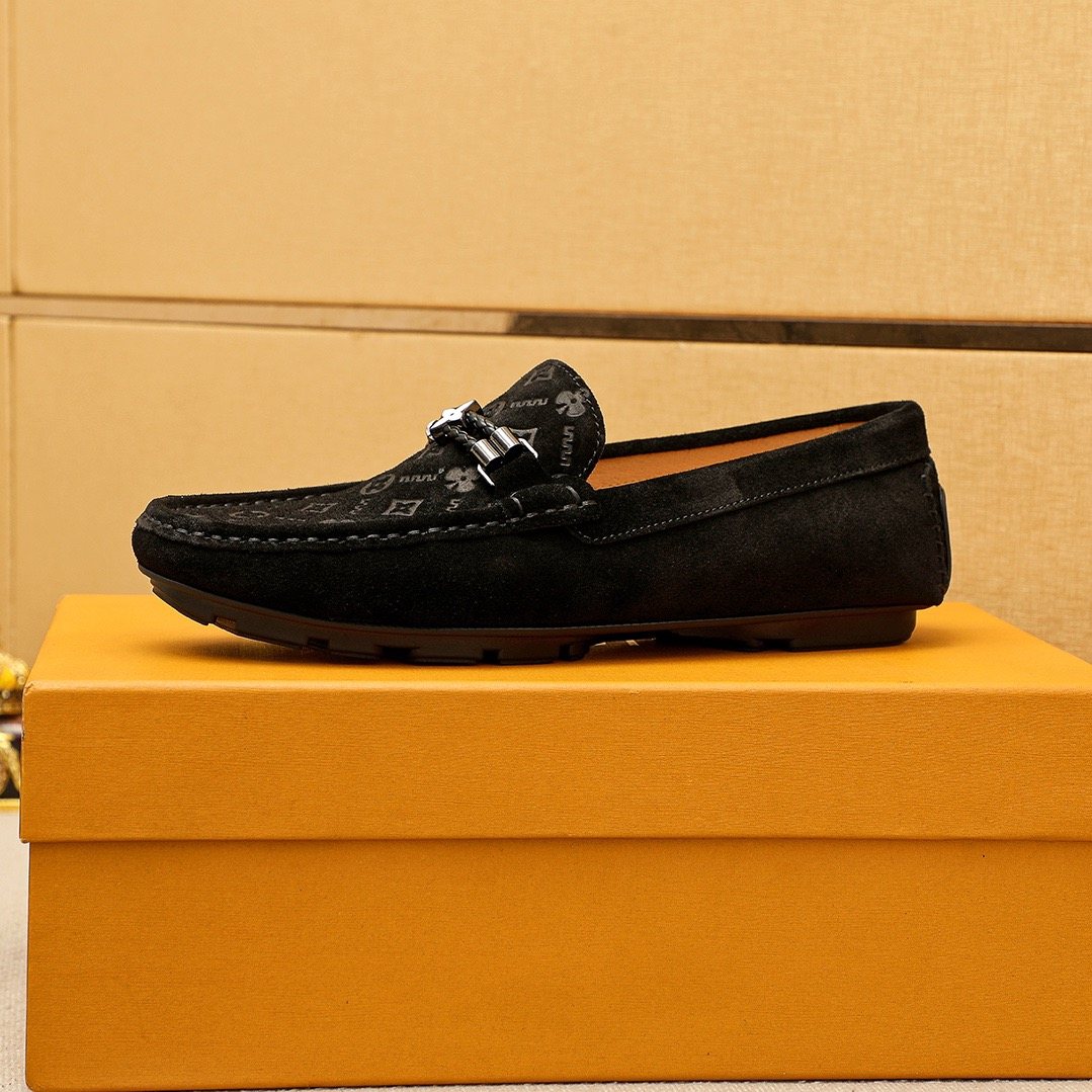 Louis Vuitton Embossed Metal-Detail Loafers — front