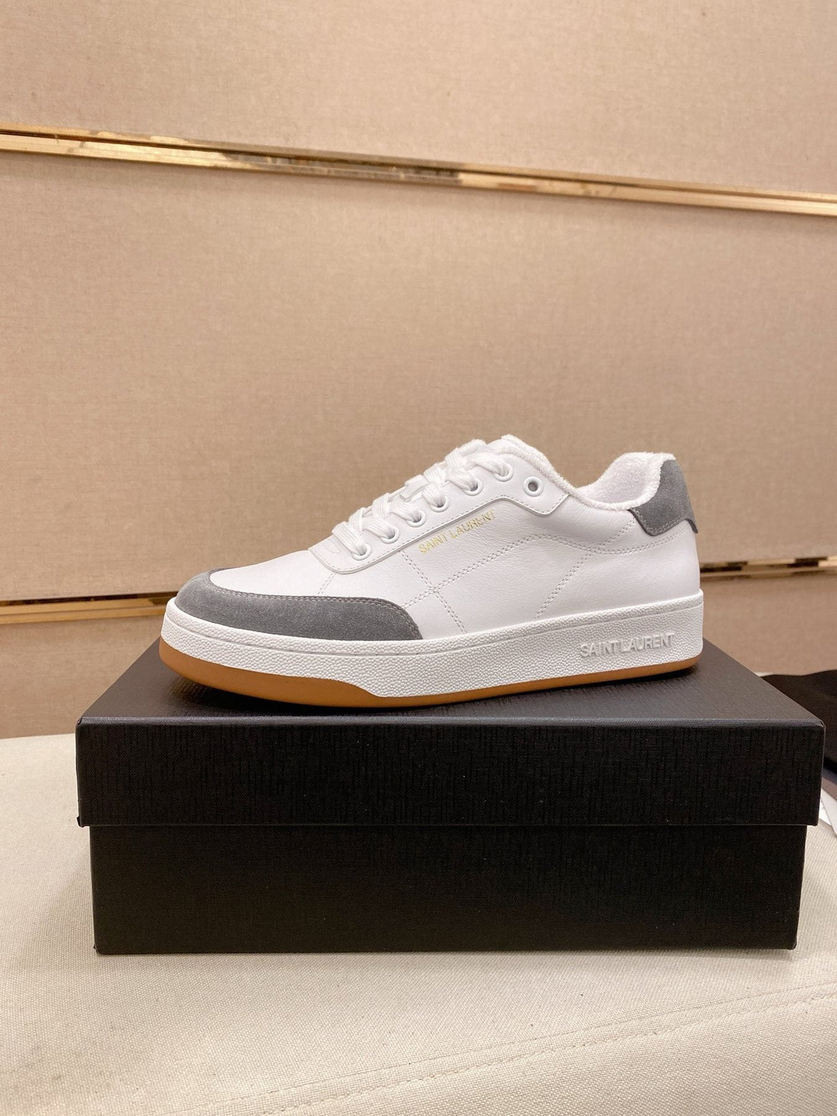 Saint Laurent Perforated Low-Top Sneakers — front