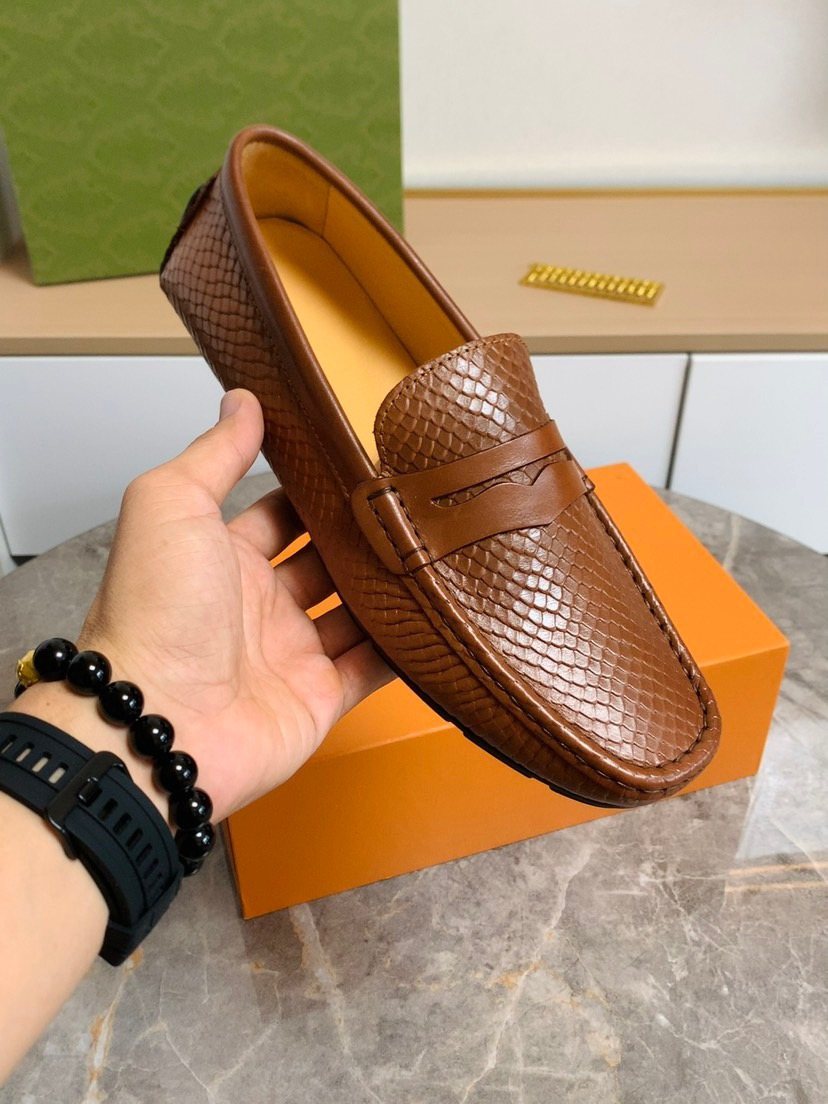 Louis Vuitton Textured Penny Loafers — model