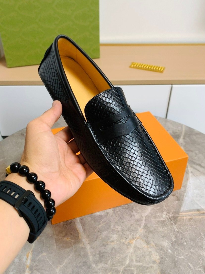 Louis Vuitton Textured Penny Loafers — back