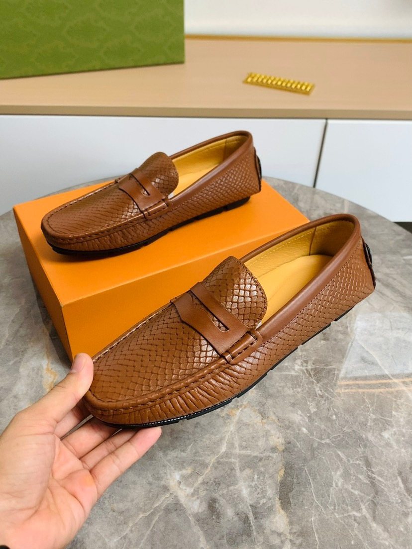 Louis Vuitton Textured Penny Loafers — side