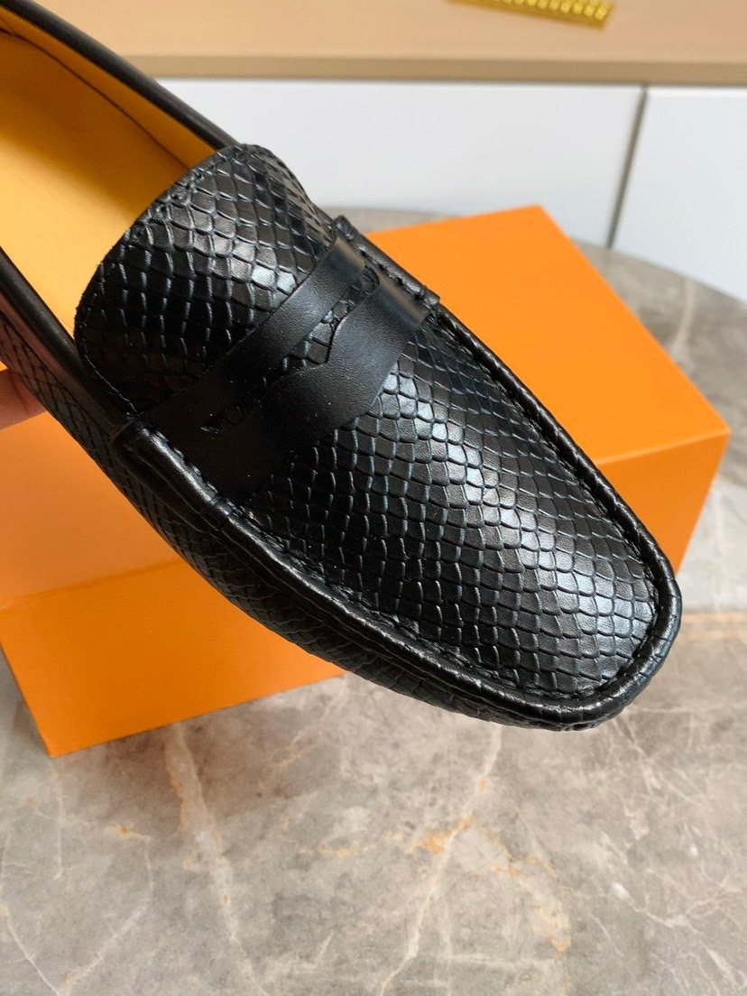 Louis Vuitton Textured Penny Loafers — back