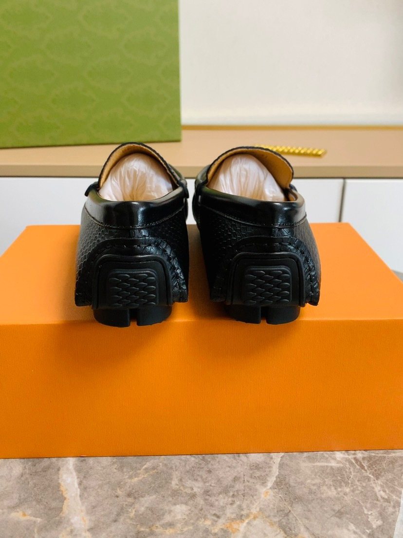 Louis Vuitton Textured Penny Loafers — side