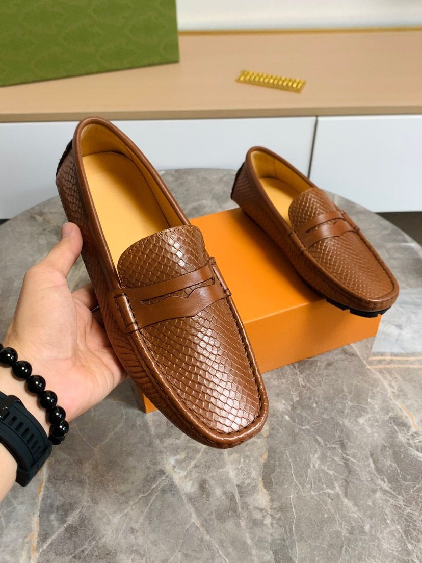 Louis Vuitton Textured Penny Loafers — model