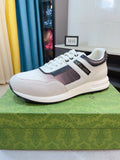 Gucci Contrast Panel Low-Top Sneakers — hero