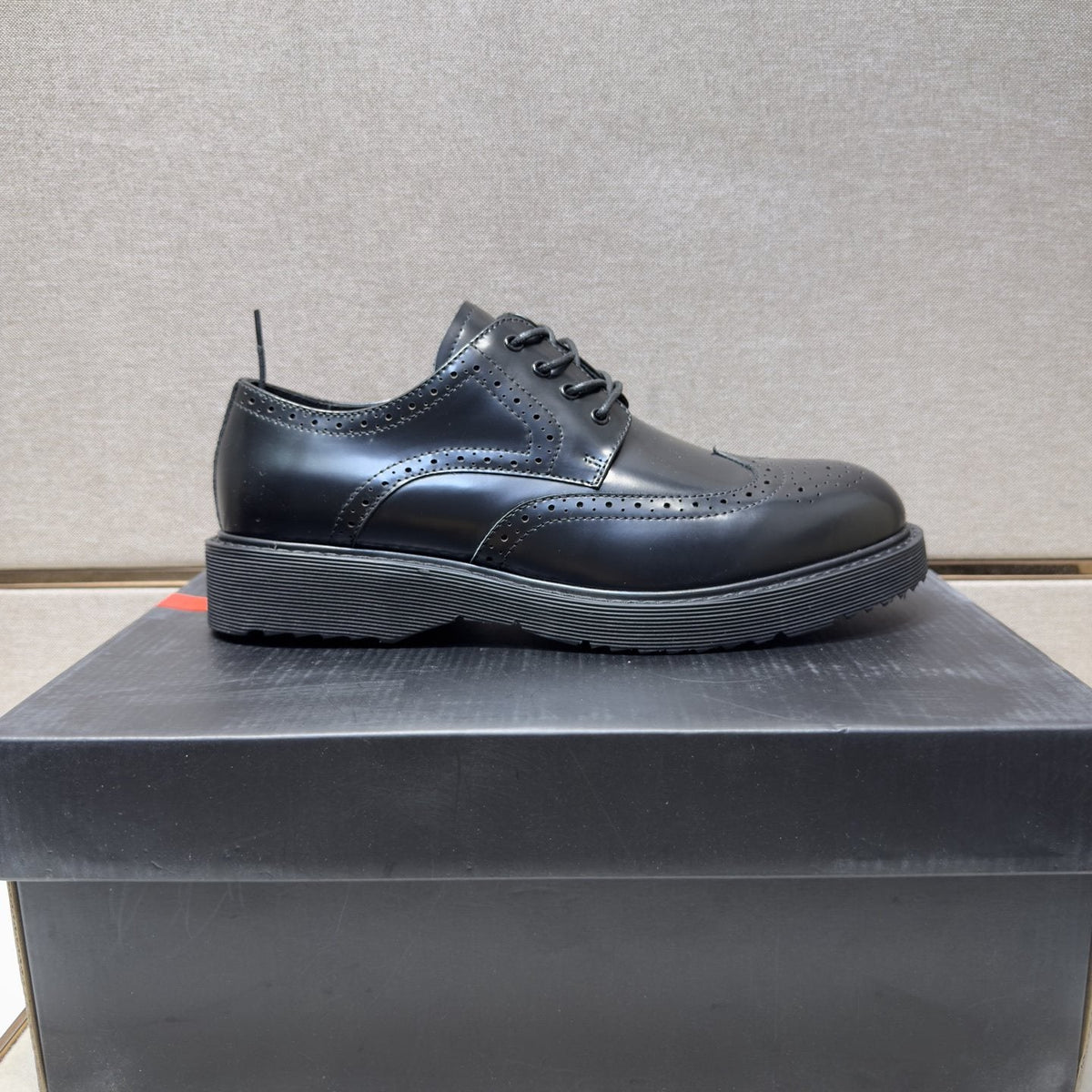 Prada Wingtip Lace-Up Shoes — hero