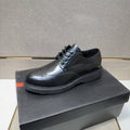 Prada Wingtip Lace-Up Shoes — front