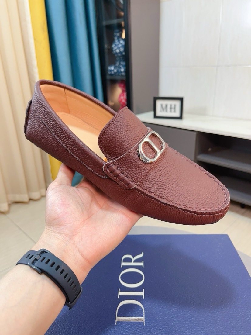 Dior Pebbled Buckle Loafers — model