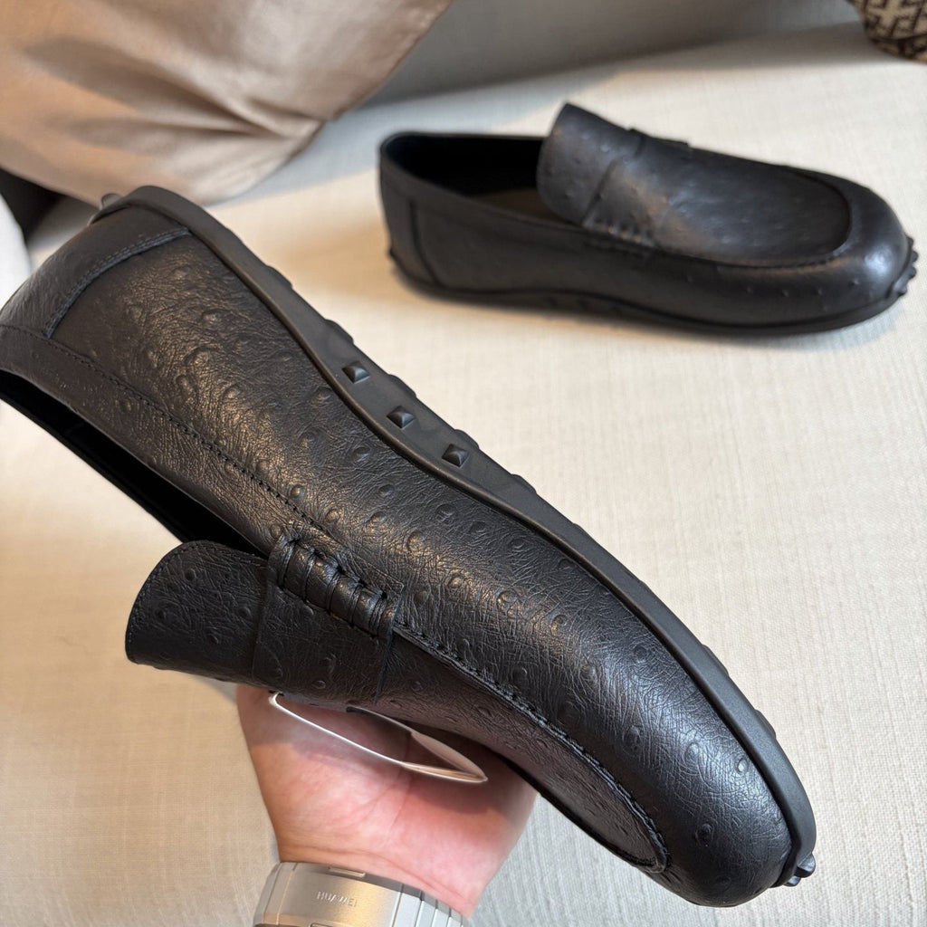 Hermès Textured Studded-Sole Loafers — side